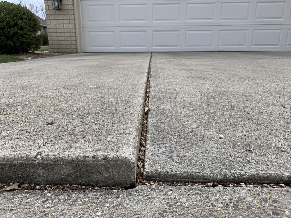 Settled driveway slab